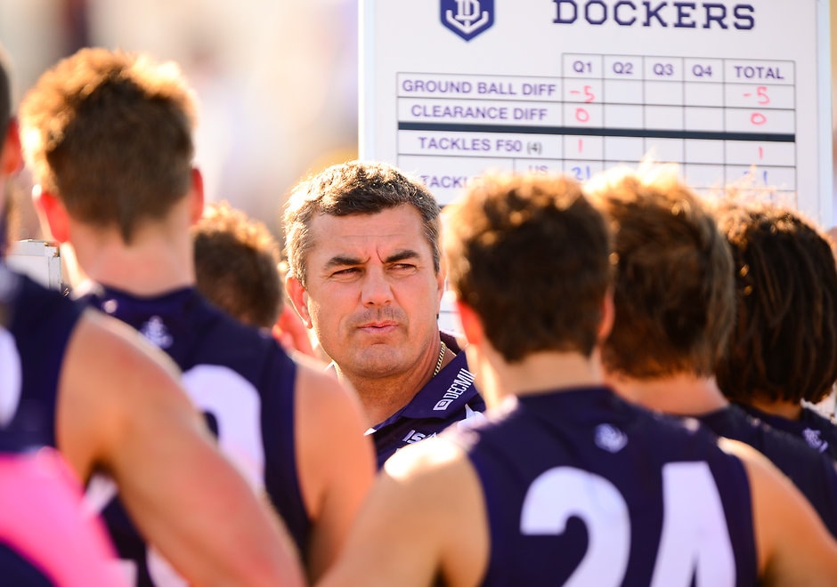 AFL 2014 NAB Challenge - Fremantle v West Coast Peter Sumich, game day coach of the Dockers, addresses the team at quarter time during the 2014 NAB Challenge match between the Fremantle Dockers and the West Coast Eagles at Arena Joondalup, Perth on February 18, 2014. (Photo: Daniel Carson/AFL Media)